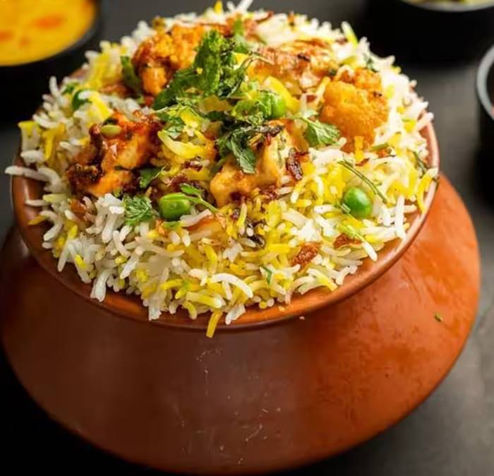 biryani Top 5 Authentic Food Destinations in Hyderabad